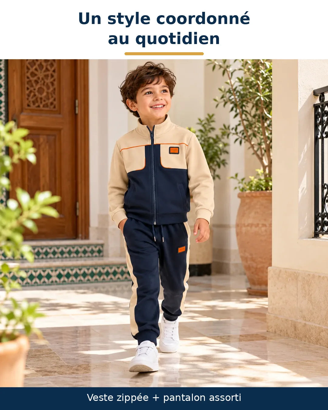Enfant portant un ensemble veste zippée et pantalon assorti